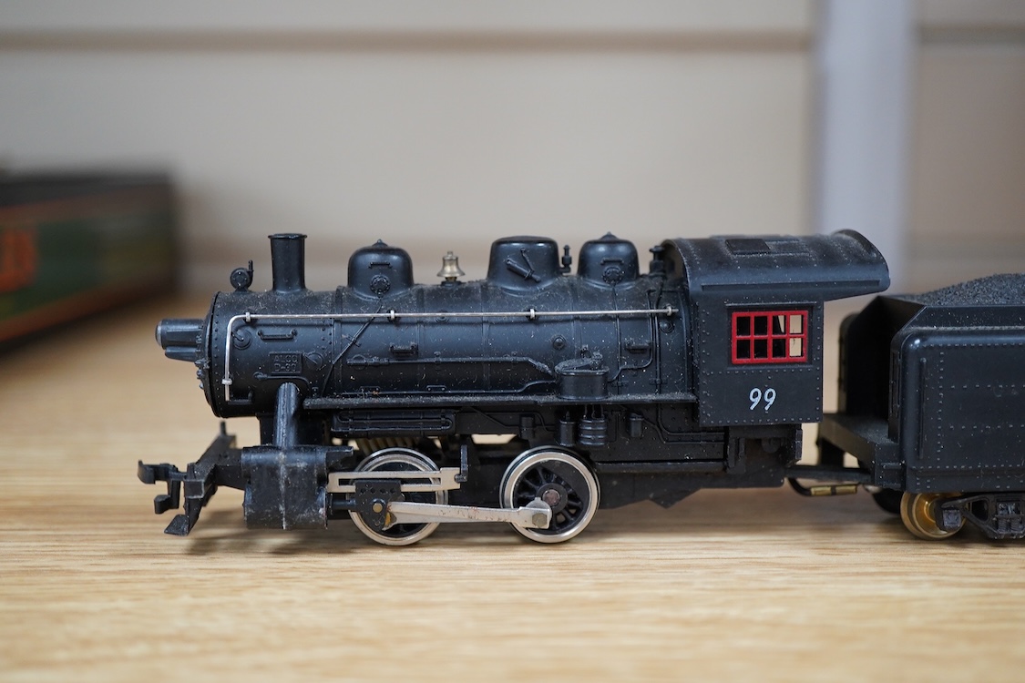 A quantity of US outline HO railway by Athearn, Bachmann, etc. including three locomotives; a Union Pacific Bo-Bo diesel, 1468, a Santa Fe Bo-Bo diesel, 5707, and a Santa Fe 0-4-0 tender engine, together with a 12-wheel